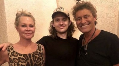Alex with his estranged parents.